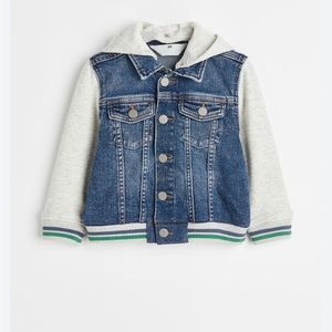 Jean jacket hoodie with snap buttons and removable hood.